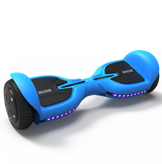 Dynamic portrayal of a blue RIDEO Q3-C hoverboard in a modern, architectural environment, highlighting its sleek design and vibrant undercarriage lighting.