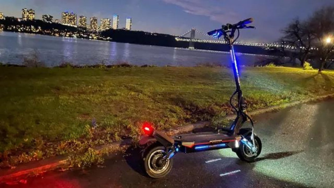 A Rideo e-scooter with colorful lights parked on the side of the road. Blog Image